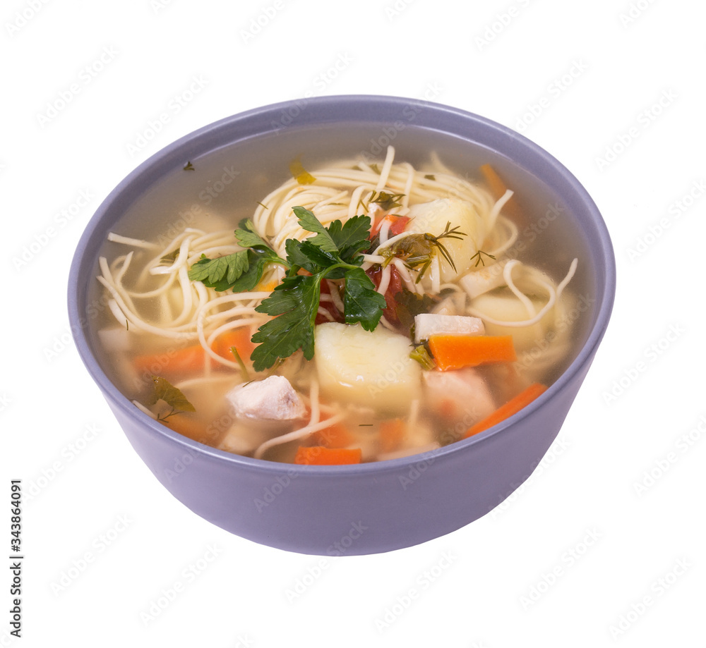 Plate of delicious chicken soup with noodles and parsley leaves, isolated on white background, angle view Plate of delicious chicken soup with noodles and parsley leaves, isolated on white background, angle view
