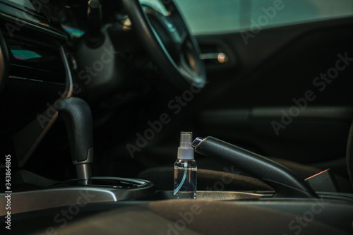 disinfectant spray on car,prevent infection of Covid-19 virus © Sitthiporn