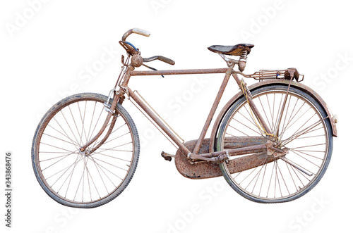 Retro rusted tbicycle isolated on white background. Aged and flat tyres bike.