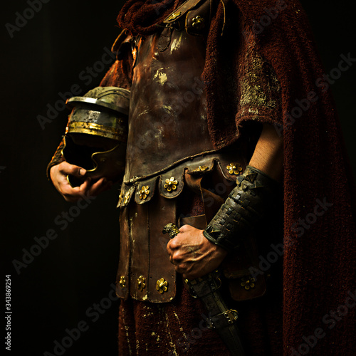 roman soldier with his armor and with black background