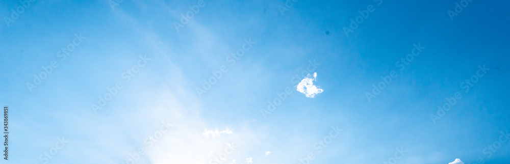 Panorama blue sky background with tiny clouds.Blue backdrop in the air. Abstract style for text. Panorama blue sky background with tiny clouds.Blue backdrop in the air. Abstract style for text.