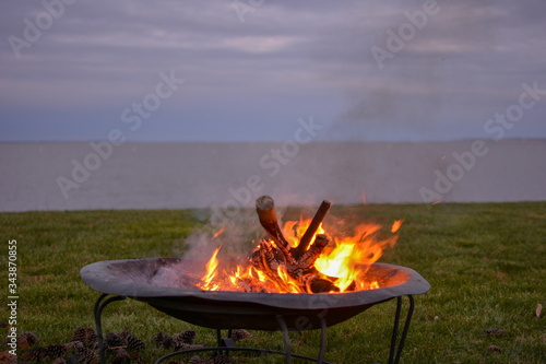 Bonfire in a waterfront backyard along the Chesapeake Bay