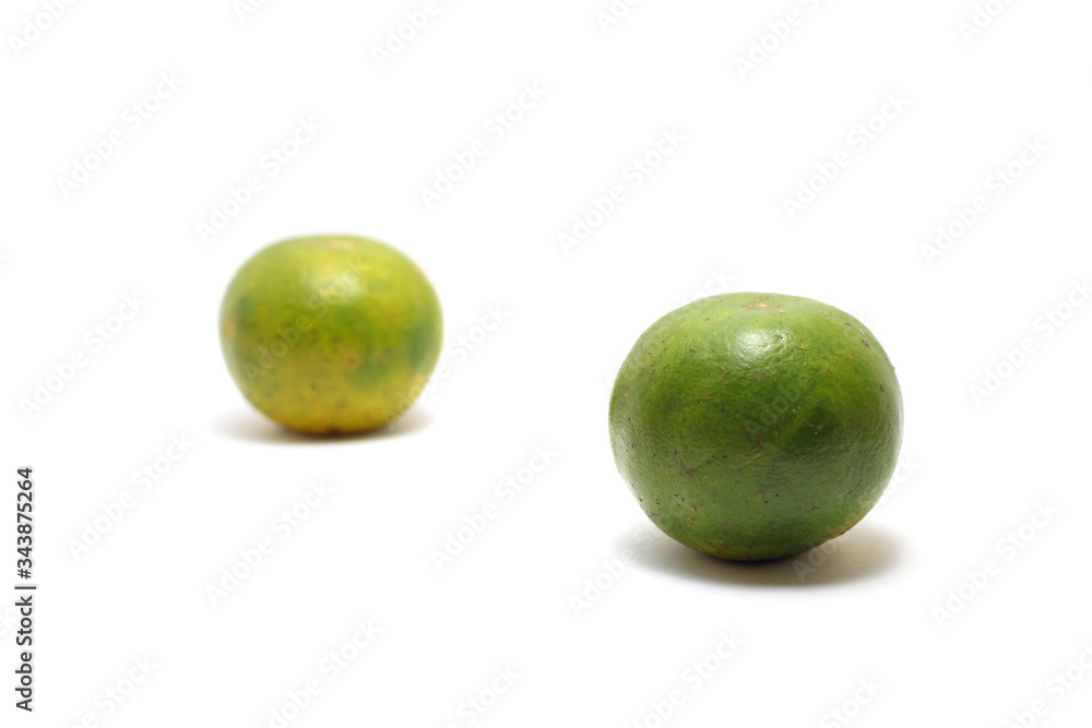Two sweet oranges (Citrus sinensis) isolated on white background, perfect for breakfasting during ramadan Two sweet oranges (Citrus sinensis) isolated on white background, perfect for breakfasting during ramadan