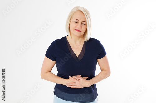 Fotografie Middel age Woman holding her stomach with her hands, blonde woman with stomach a