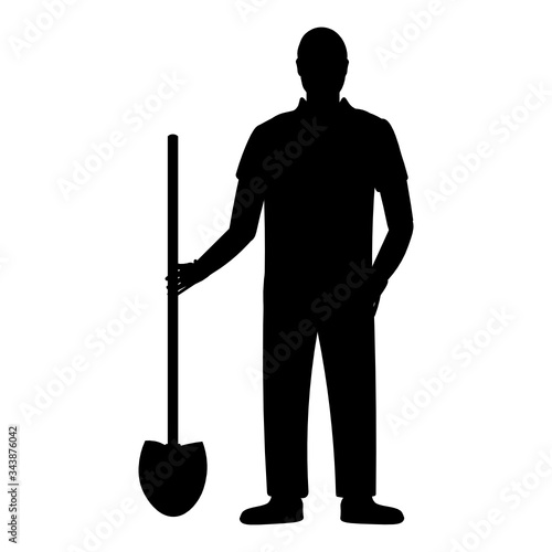 Silhouette of a farmer with a shovel isolated on a white background.