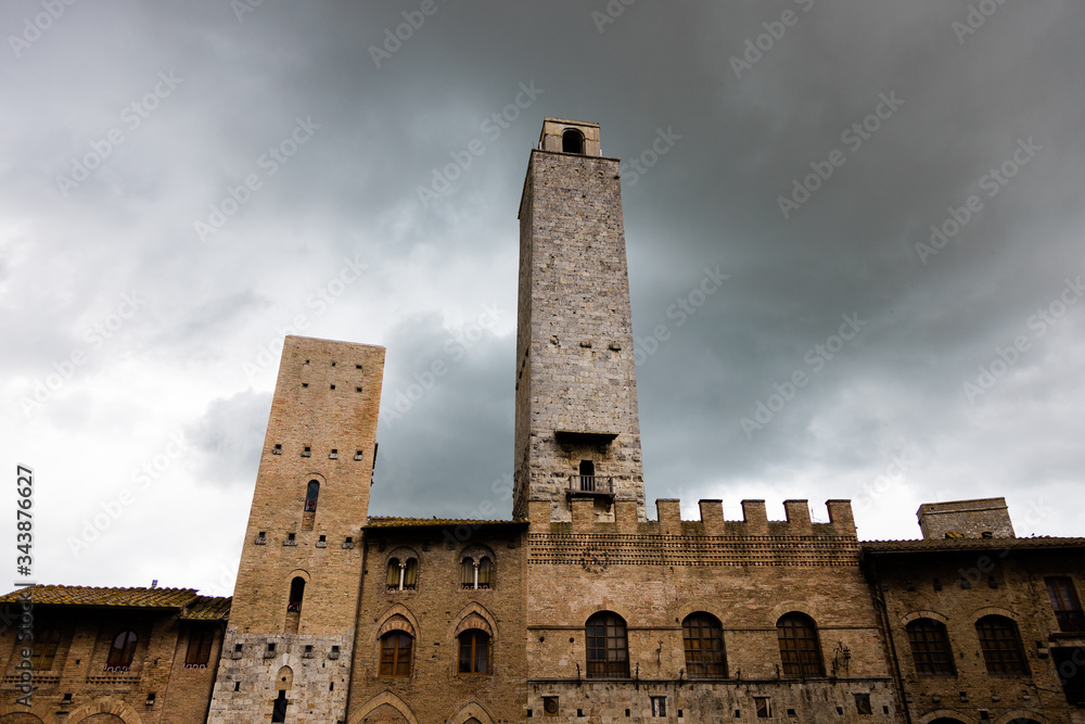 Stormy weather over high towers of San Gimignano, Tuscany, Italy