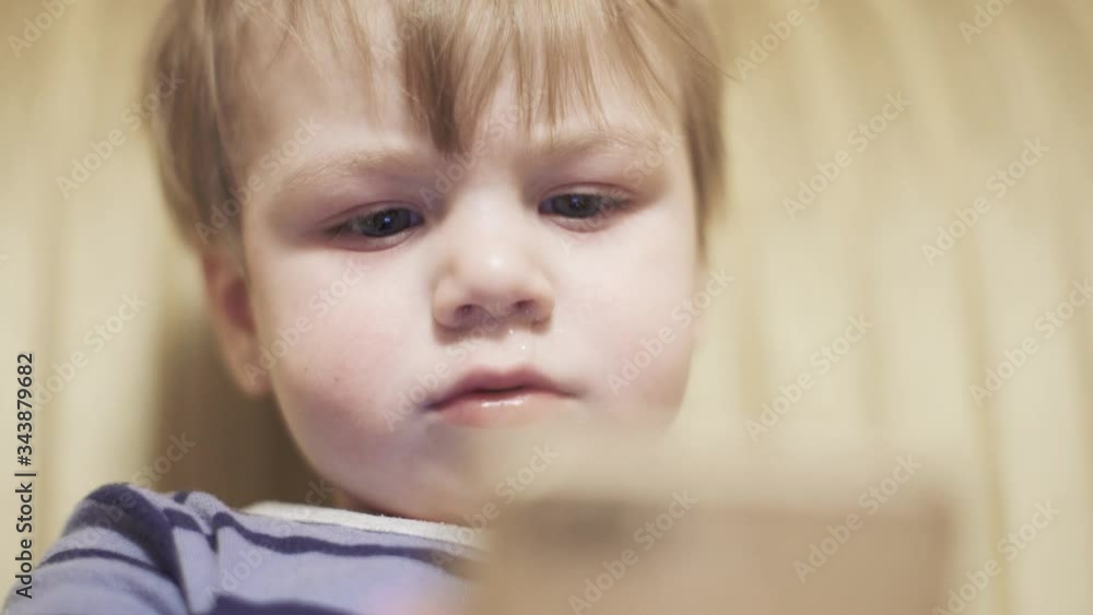 Boy playing with snot Boy playing with snot