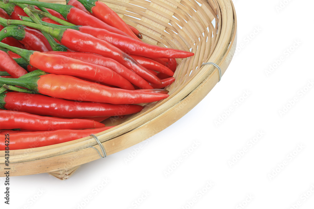 Chilli pepper in basket isolated on white background. This has clipping path. Chilli pepper in basket isolated on white background. This has clipping path.