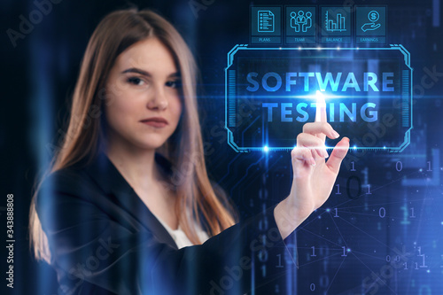 Business, Technology, Internet and network concept. Young businessman working on a virtual screen of the future and sees the inscription: Software testing