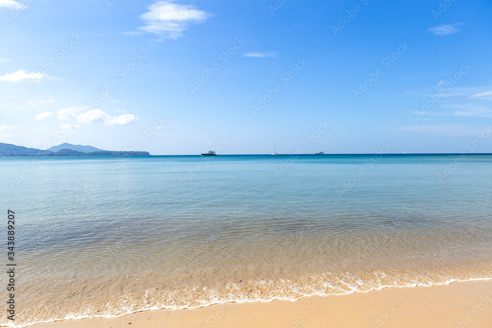 Clean sea water and fine sand beach, summer outdoor day light, Phuket island in South of Thailand, holiday and vacation destination in Asia