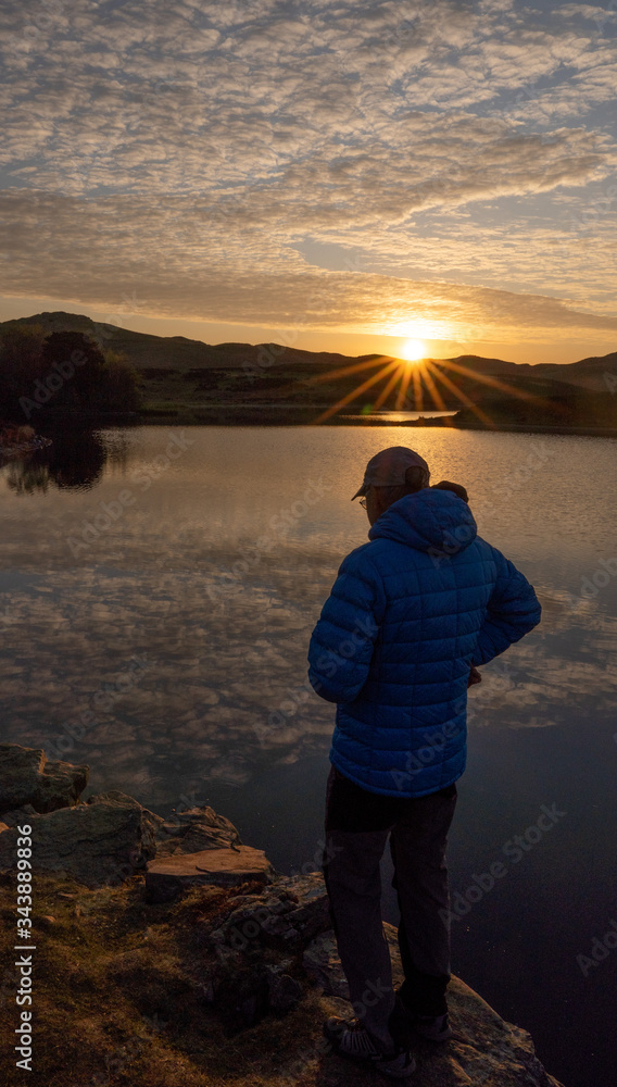 silhouette of a man By lake silhouette of a man By lake