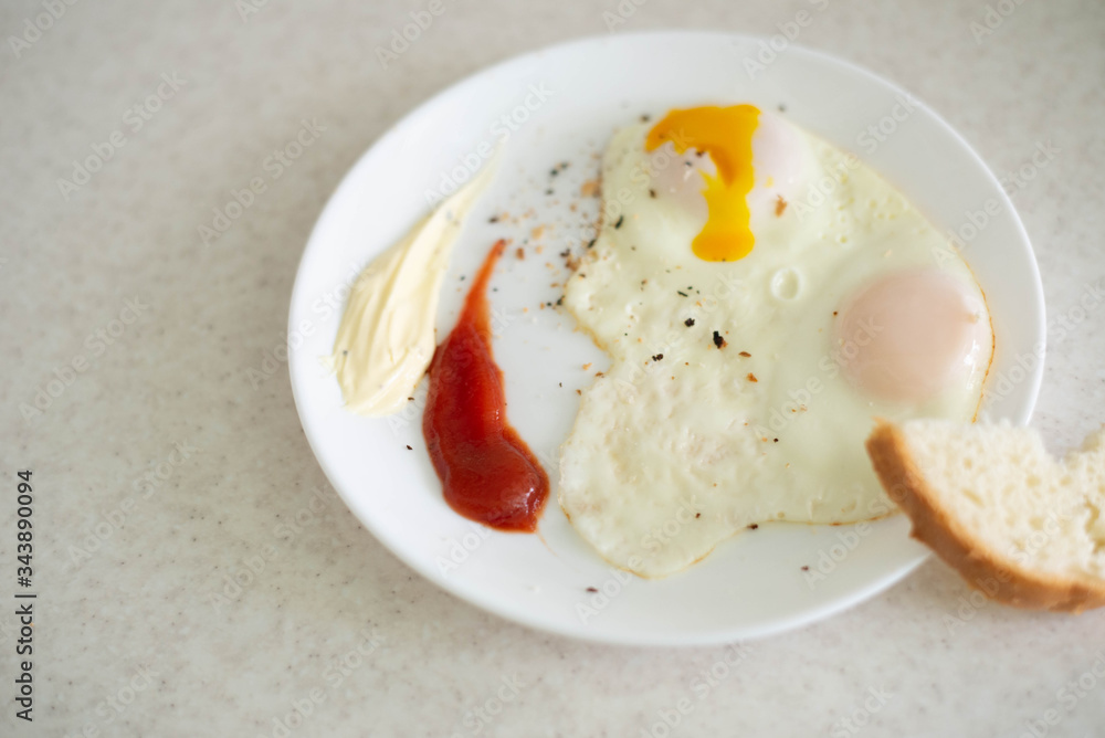Scrambled eggs on a white plate Scrambled eggs on a white plate