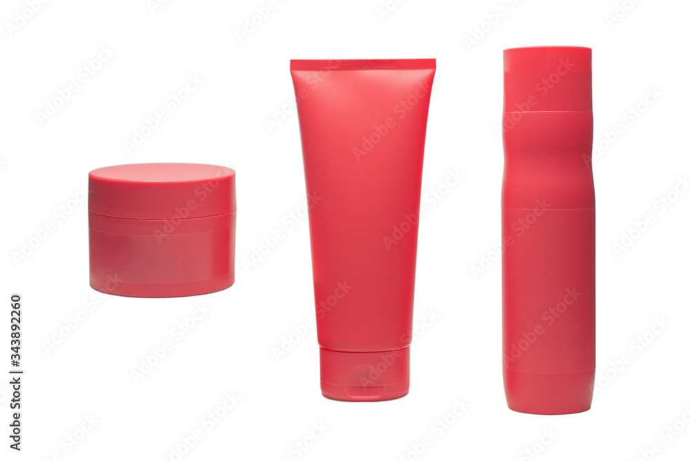 Plastic red bottles on a white background. screw cap, mix collection Plastic red bottles on a white background. screw cap, mix collection