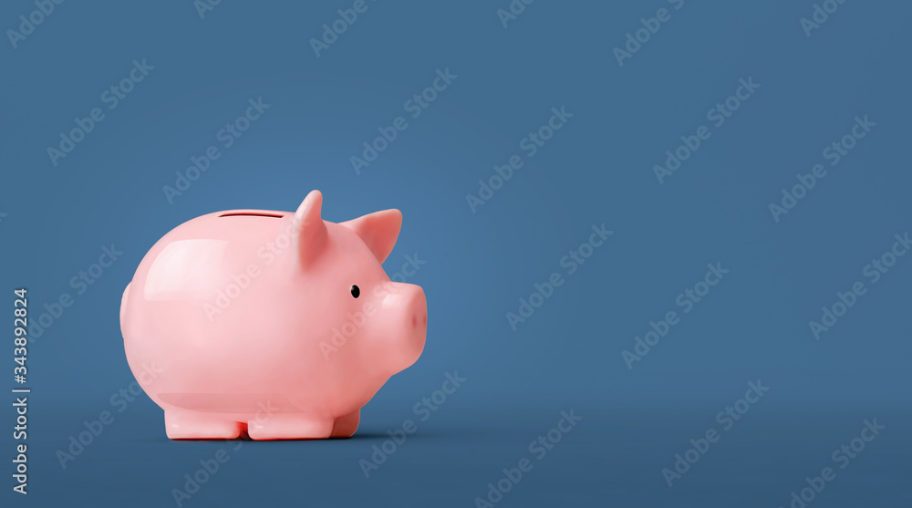 Piggy bank isolated on blue background
