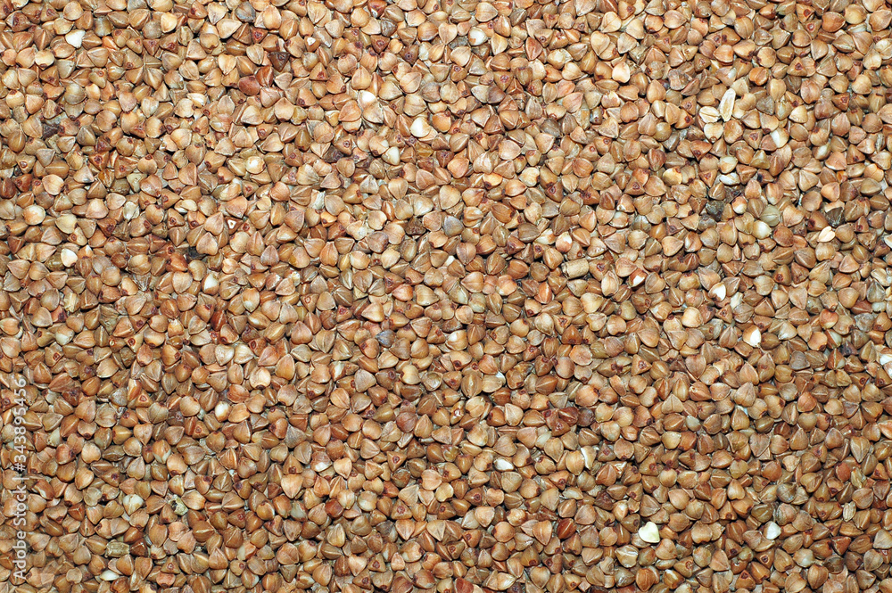 Buckwheat groats. Background from buckwheat grains.
Buckwheat groats. Background from buckwheat grains.