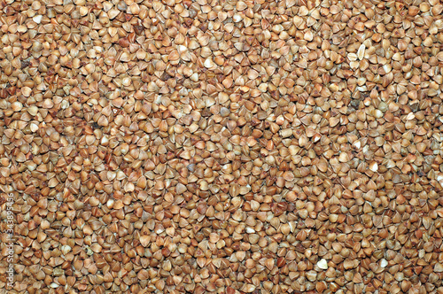  Buckwheat groats. Background from buckwheat grains.