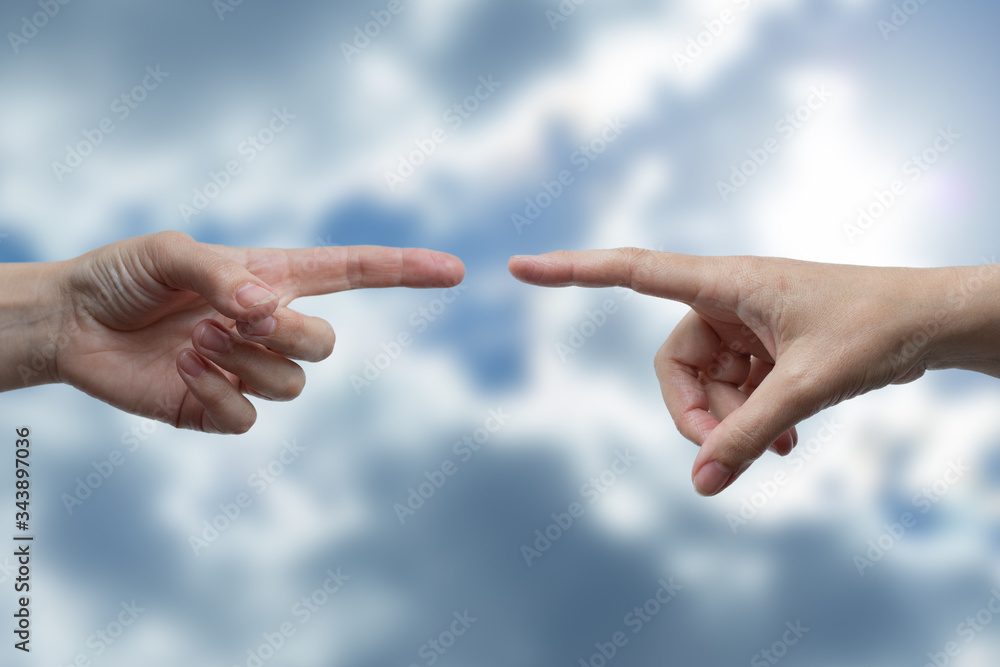 two hands trying to touch each other. social distance concept during the pandemia. two hands trying to touch each other. social distance concept during the pandemia.