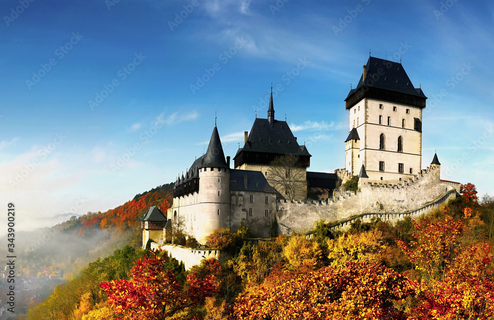 Beautiful scenic castle in autumn landscape panorama