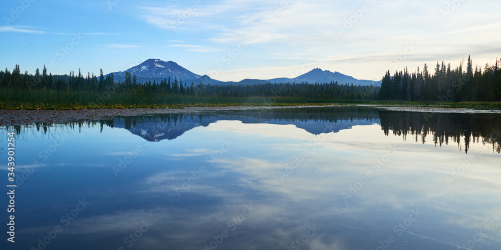 Early morning panoramic view of the South Sister mountain from the Hosmer Lake in Central Oregon.