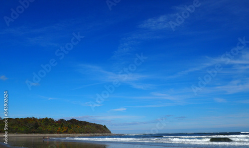 The beautiful Atlantic Ocean under a cloudy sky is a dramatic seascape. It is a great place for walking along the shore, swimming, fishing or just lying on towel for well-earned rest and relaxation.