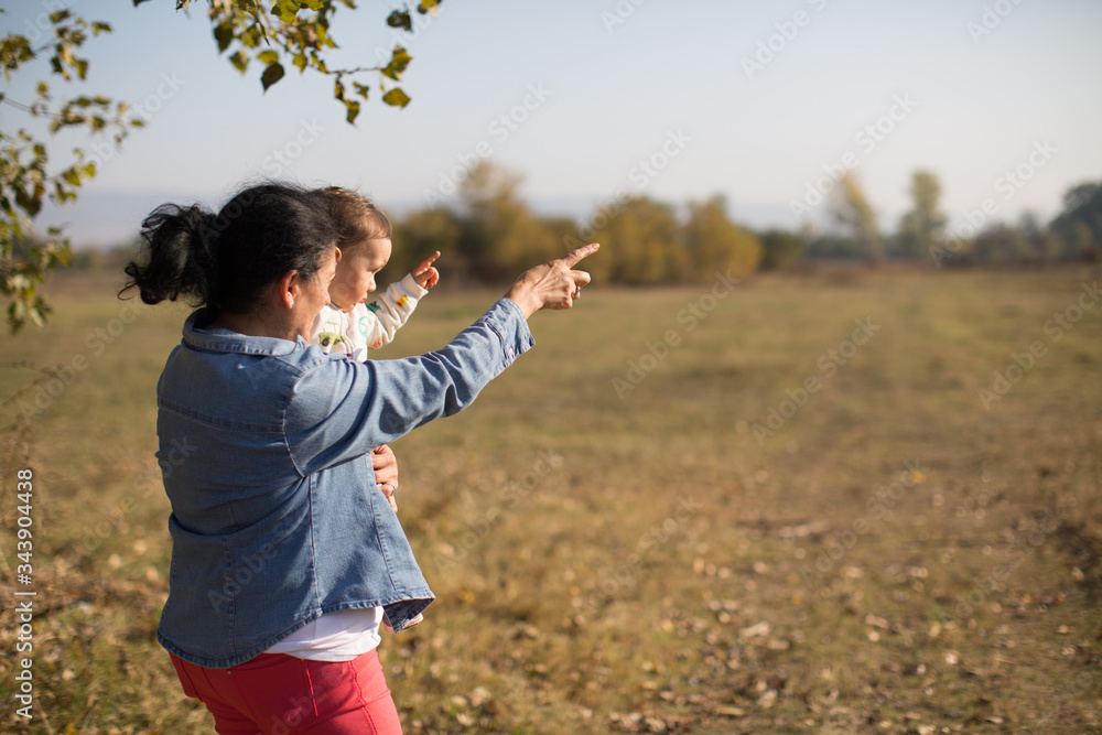Granny and her grandson pointing fingers Granny and her grandson pointing fingers