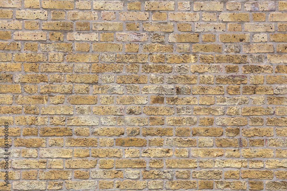 Naklejka premium Yellow bricks background