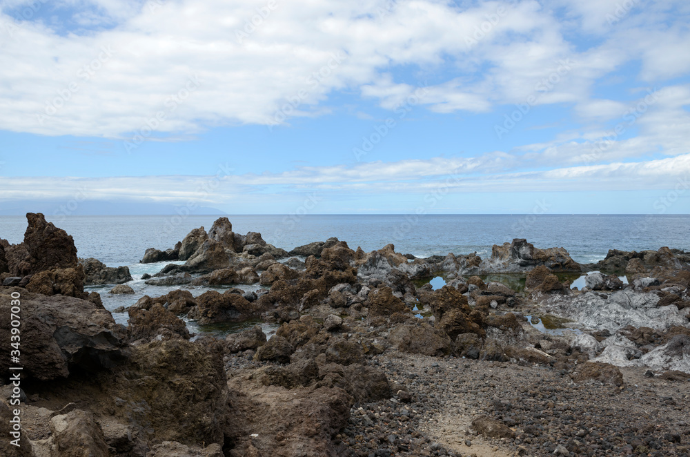 View from volcanogenic rocks towards Gomera island, Tenerife, Canary. View from volcanogenic rocks towards Gomera island, Tenerife, Canary.