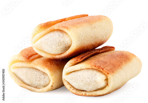 Three fried stuffed pancakes on a white background. Isolated