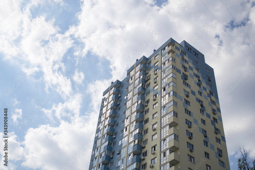 Multi-storey residential modern house against the sky. Residential area. Eastern Europe