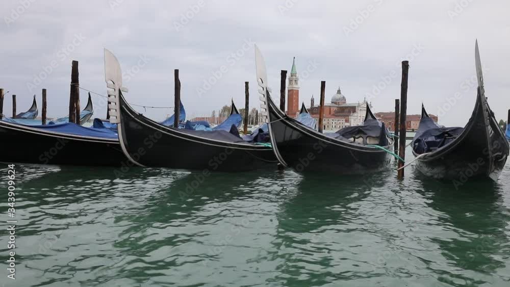 Bow of the gondolas the typical boats for tourists in Venice Bow of the gondolas the typical boats for tourists in Venice