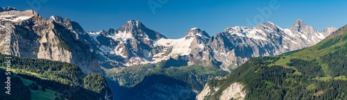 Switzerland, Panoramic view on Murren and green Alps around