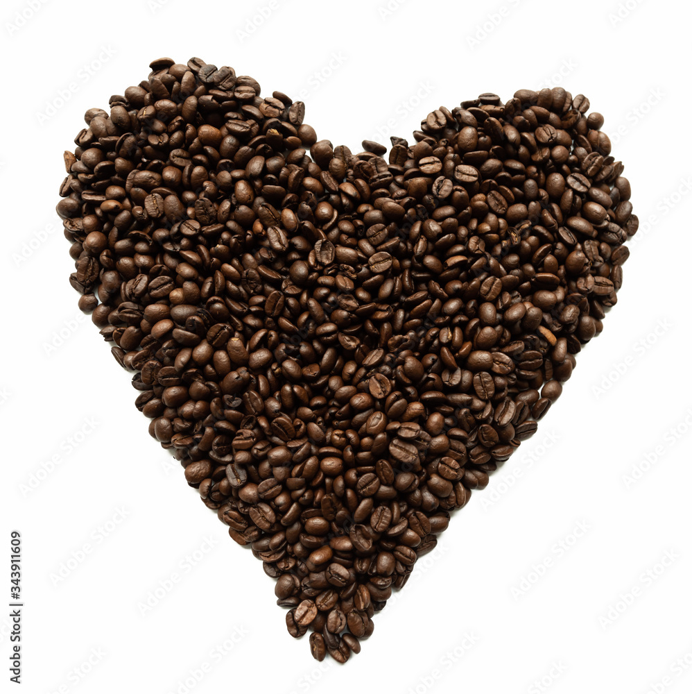 Coffee beans lying on white isolated background Coffee beans lying on white isolated background
