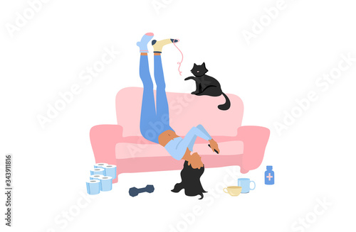 Lazy depressive woman in different socks lying upside down on the couch with smartphone and black cat staying home during coronavirus quarantine. Boring exhausting weekdays in mess. Apathy concept.