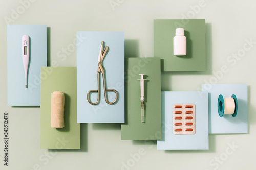 Top view of various medical items on colorful background. © narstudio
