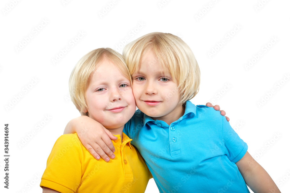 Two caucasian boys brothers posing in studio Two caucasian boys brothers posing in studio
