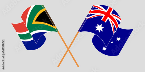 Crossed and waving flags of RSA and Australia