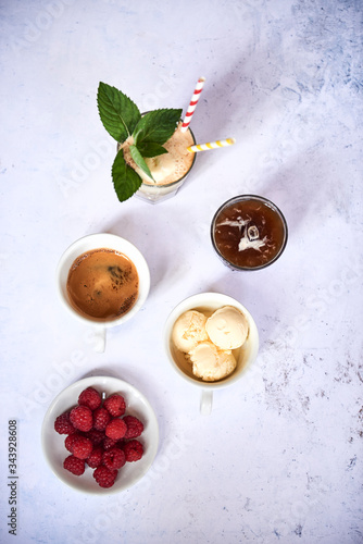 Coffees, vanilla ice cream and raspberries
