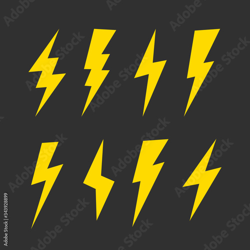 Yellow Lightning bolts, Thunderbolts, lightning strikes icon set. Thunderbolt icons isolated on black background. Vector illustration