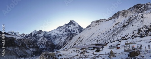 
Annapurna Sanctuary or Base Camp Wide Panoramic Landscape just before Sunrise trekking Nepal Himalaya Mountains photo