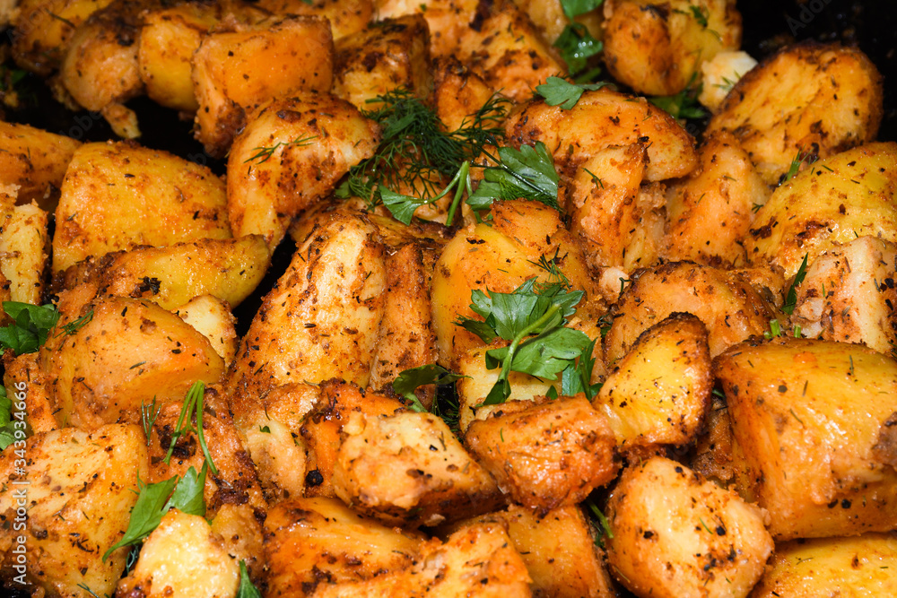 Baked potato wedges with cheese. Baked potato wedges with cheese.