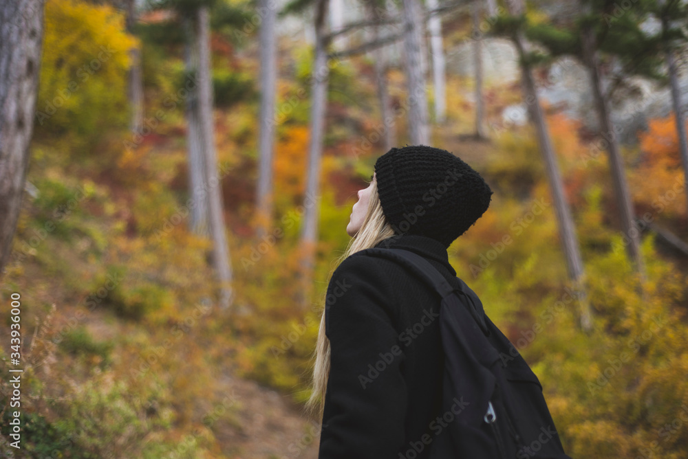 Young woman in autumn forest Young woman in autumn forest