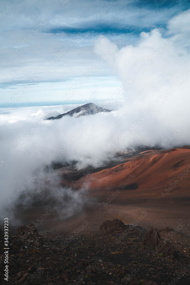 Volcanic landscape in clouds 