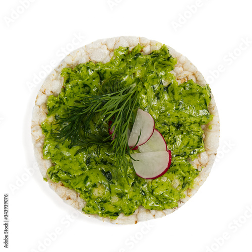 healfy food rice cake sandwich isolated on white background. Rice cakes with avocado, radish, dill photo