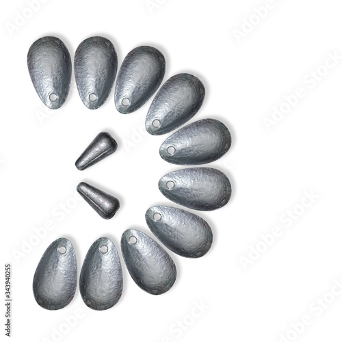 Quadro su tela The set of lead fishing sinkers is in semicircle and isolated on the white background