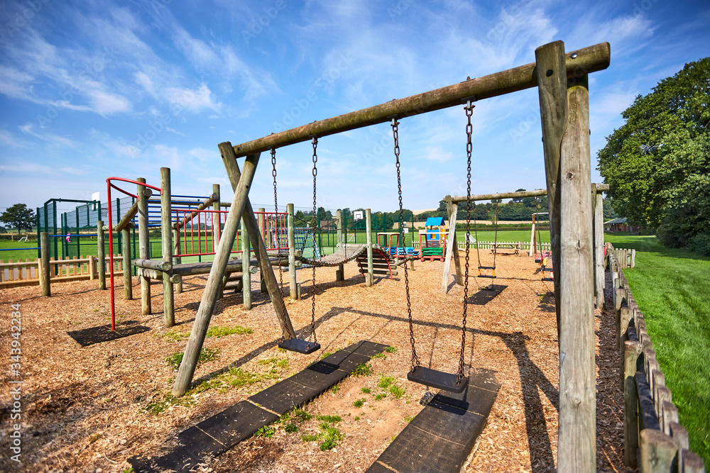 Children playground in a park during early summer