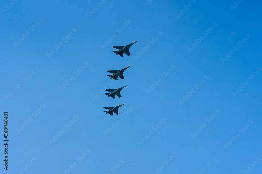 A group of professional pilots of military aircraft in sky. A group of professional pilots of military aircraft in sky.