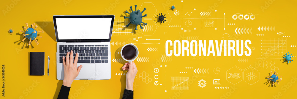 Coronavirus theme with person using a laptop computer Coronavirus theme with person using a laptop computer