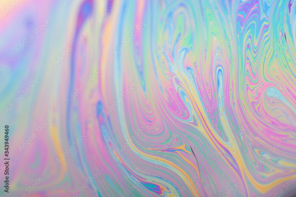 Abstract iridescent background interference light rainbow colors. Soap bubble texture