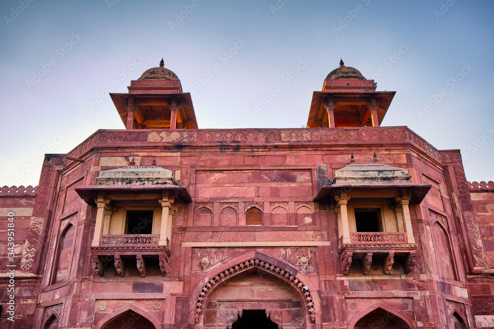 Old red sandstone palace at the Mughal city of Fatehpur Sikri in Agra, India