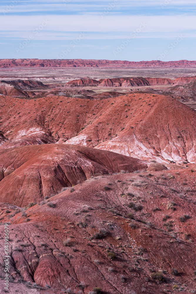 Late evening light on the Painted Desert and the vast Badlands within Petrified Forest National Park, Arizona. Late evening light on the Painted Desert and the vast Badlands within Petrified Forest National Park, Arizona.